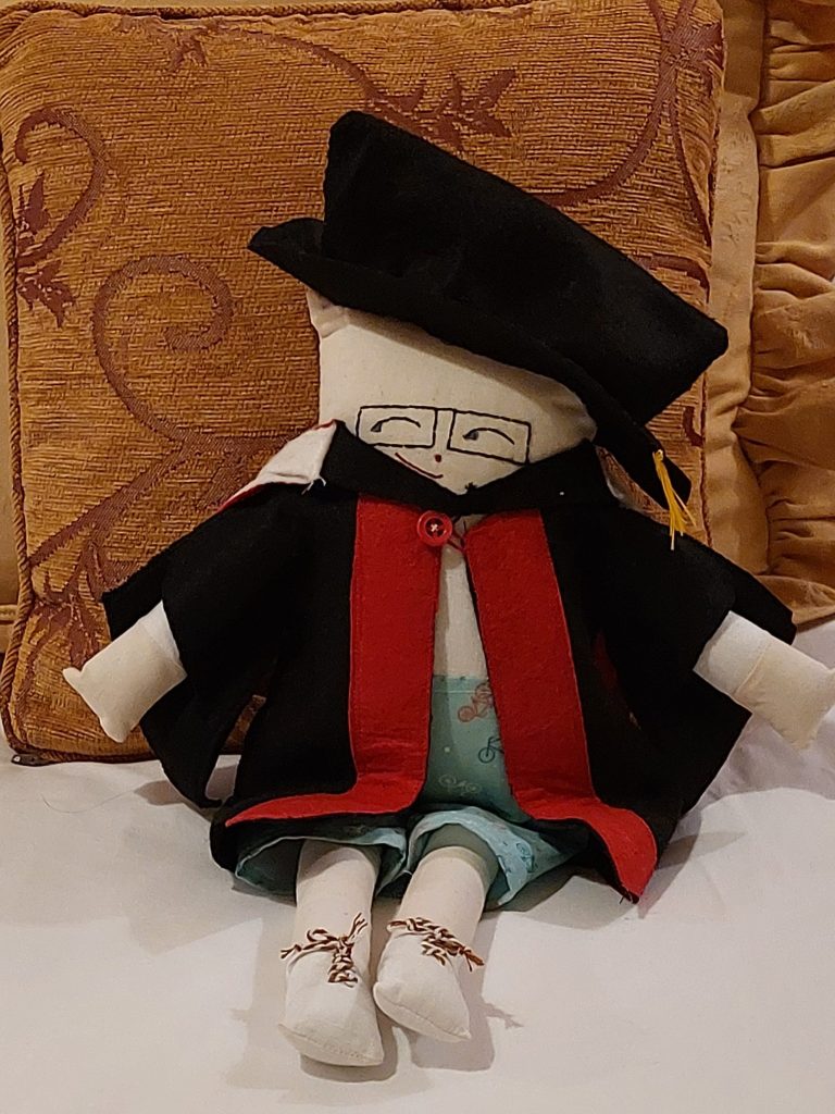 'Don', one of the IAML Cambridge Congress mascots, clad in academic robes